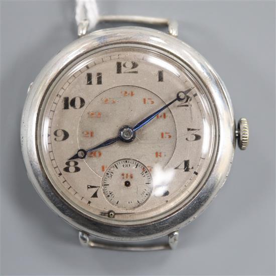 A gentlemans early 20th century white metal Omega manual wind wrist watch, with Arabic dial and subsidiary seconds (no strap).